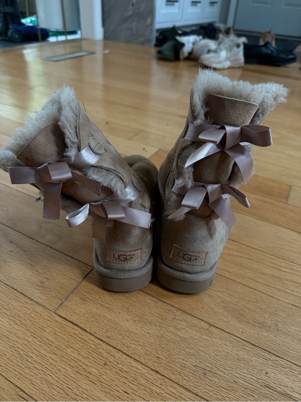 UGG Women's Chestnut Suede Shearling Boots with Satin Bows